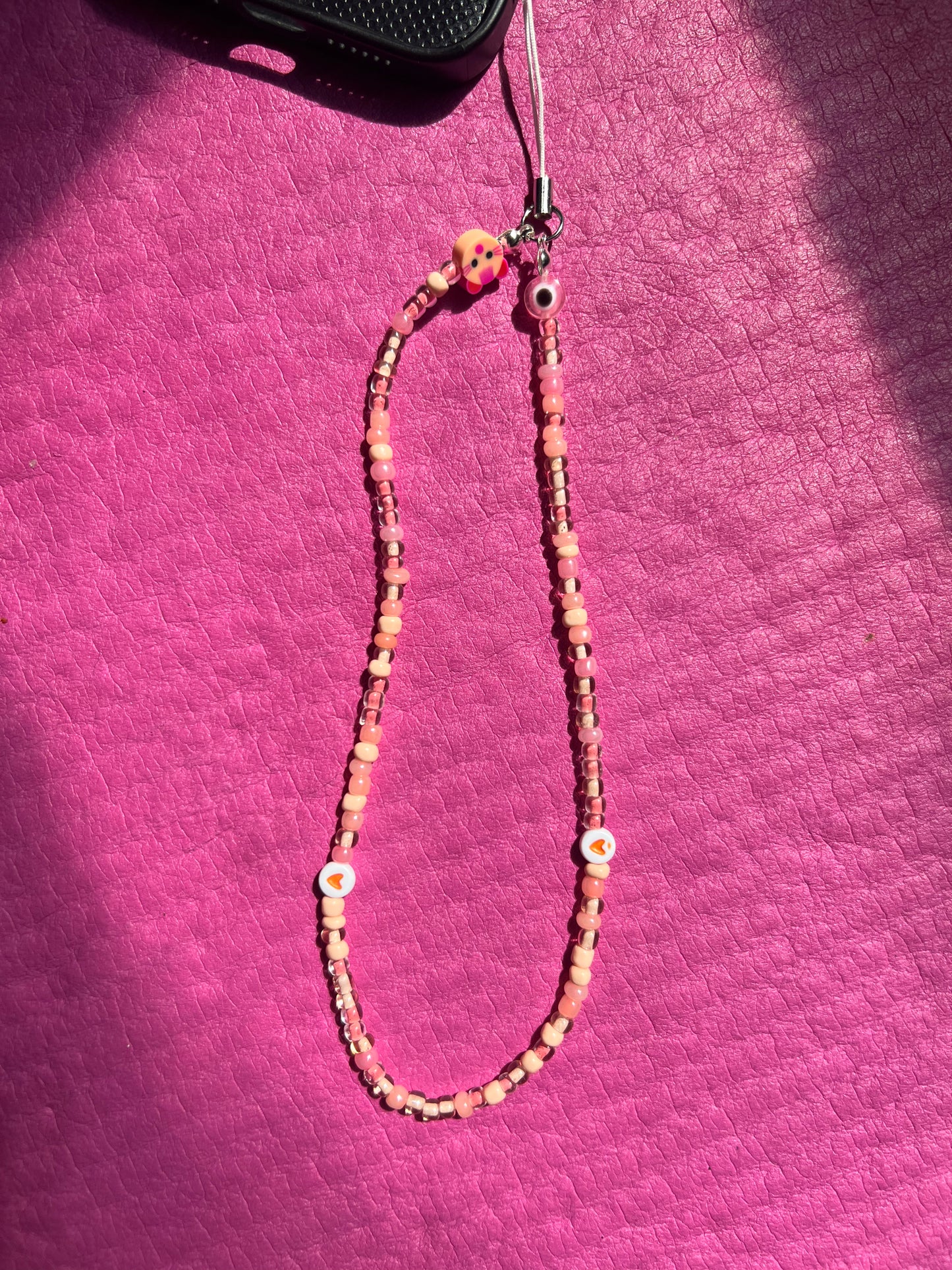 Coral pink phone charm