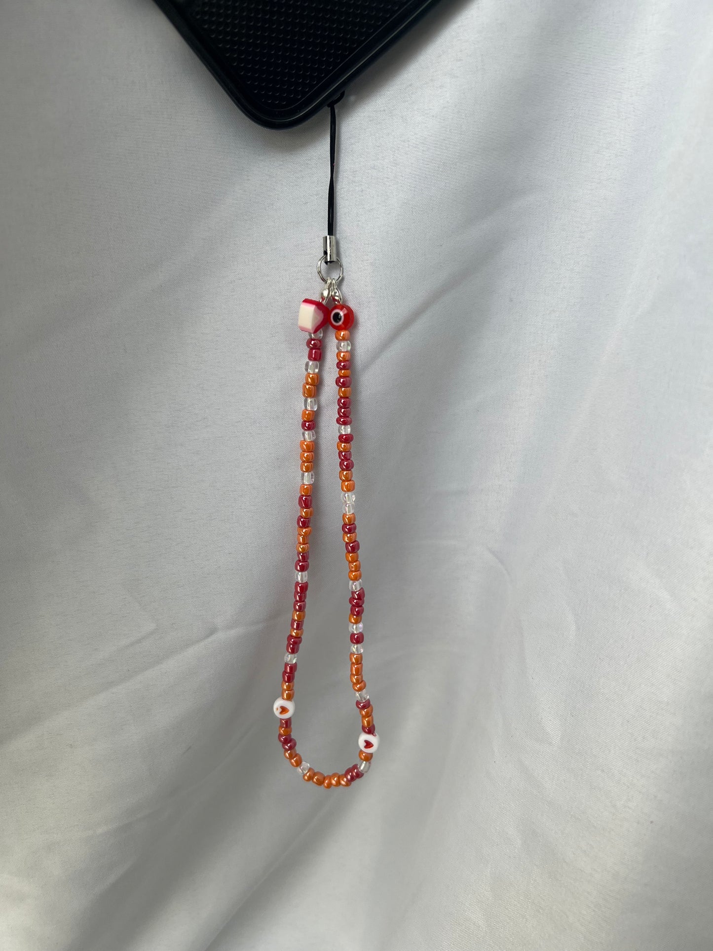 Orange and red phone charm