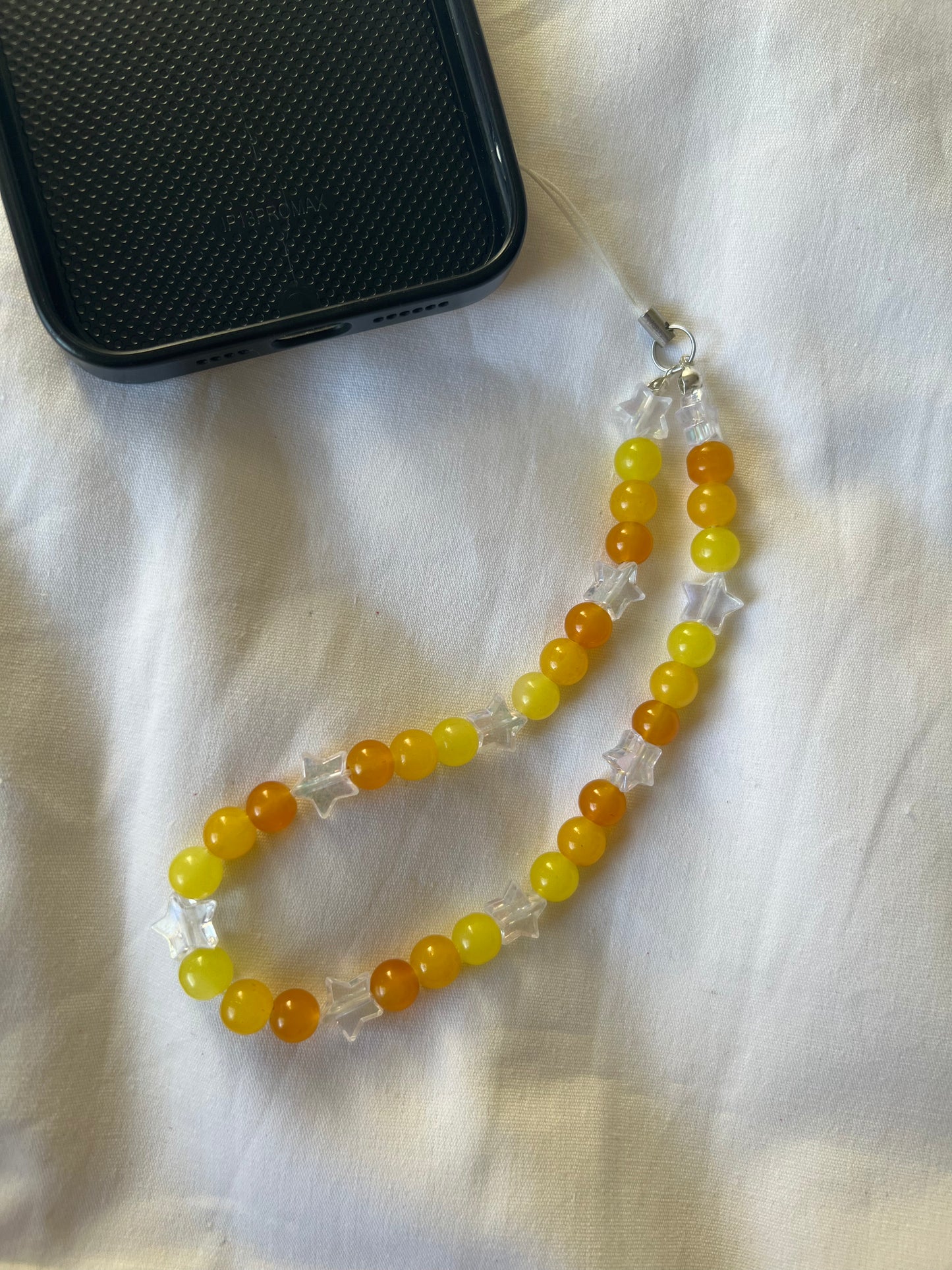 Multi orange star phone charm