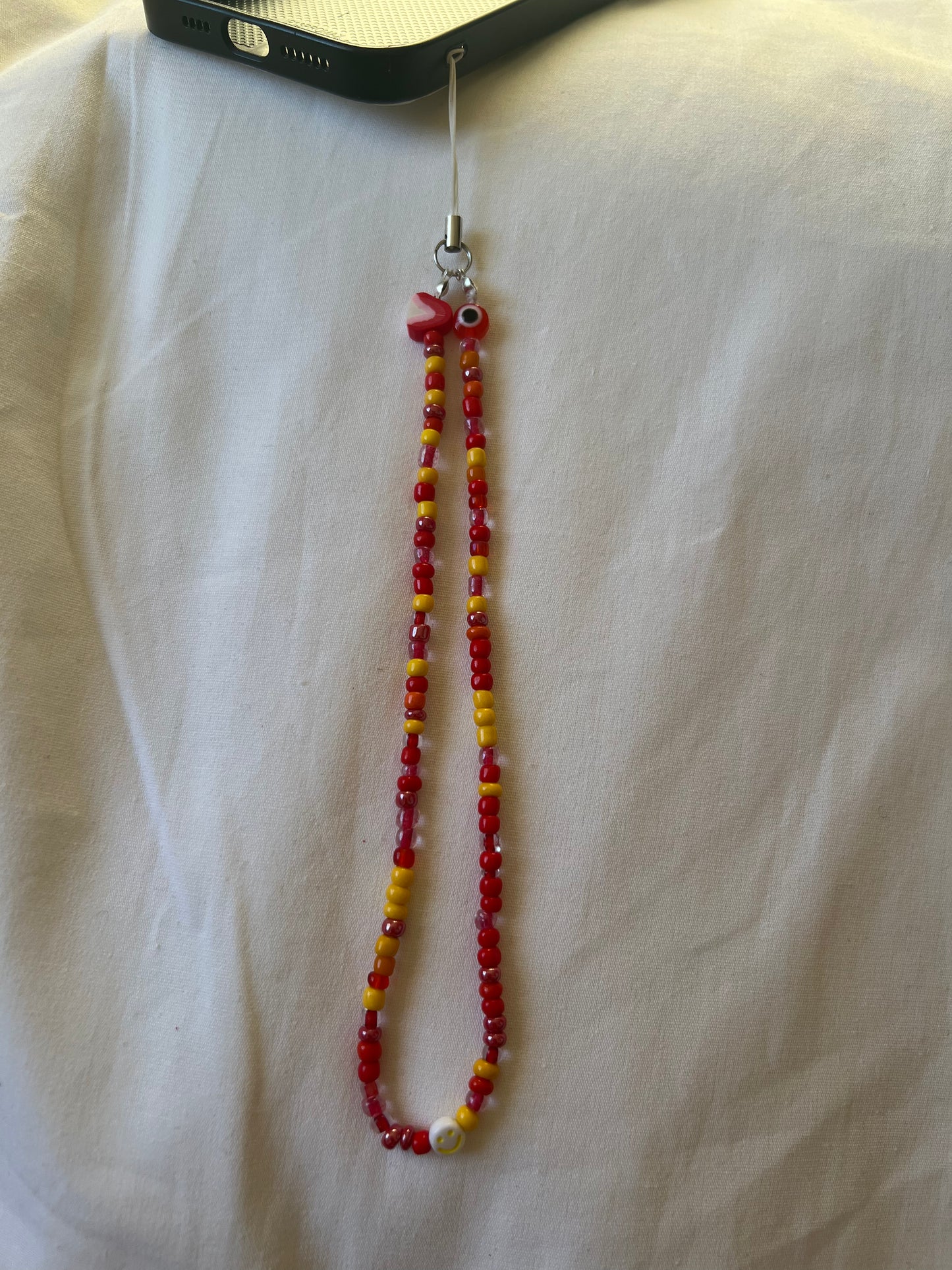 Red | Yellow phone charm