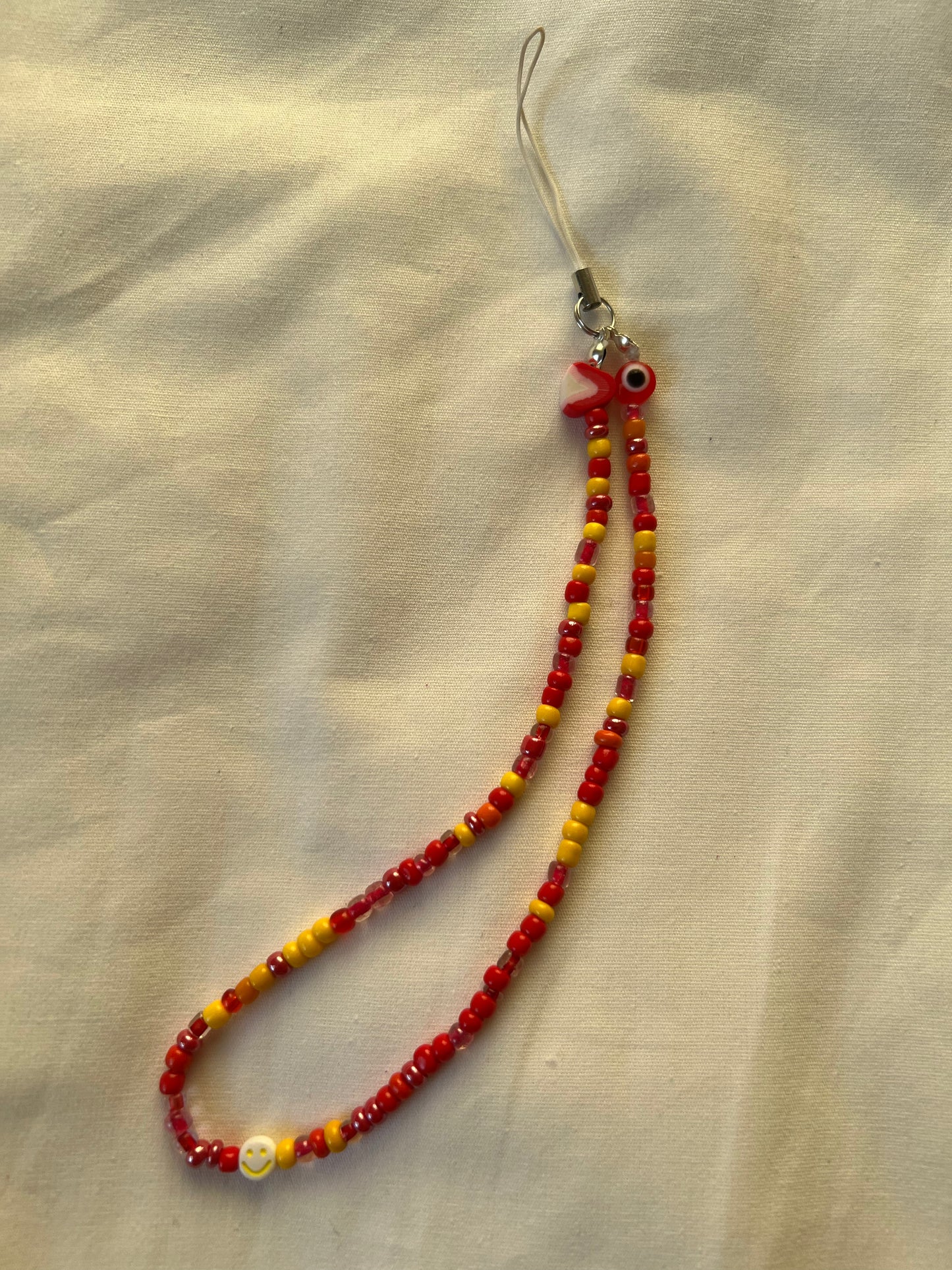 Red | Yellow phone charm