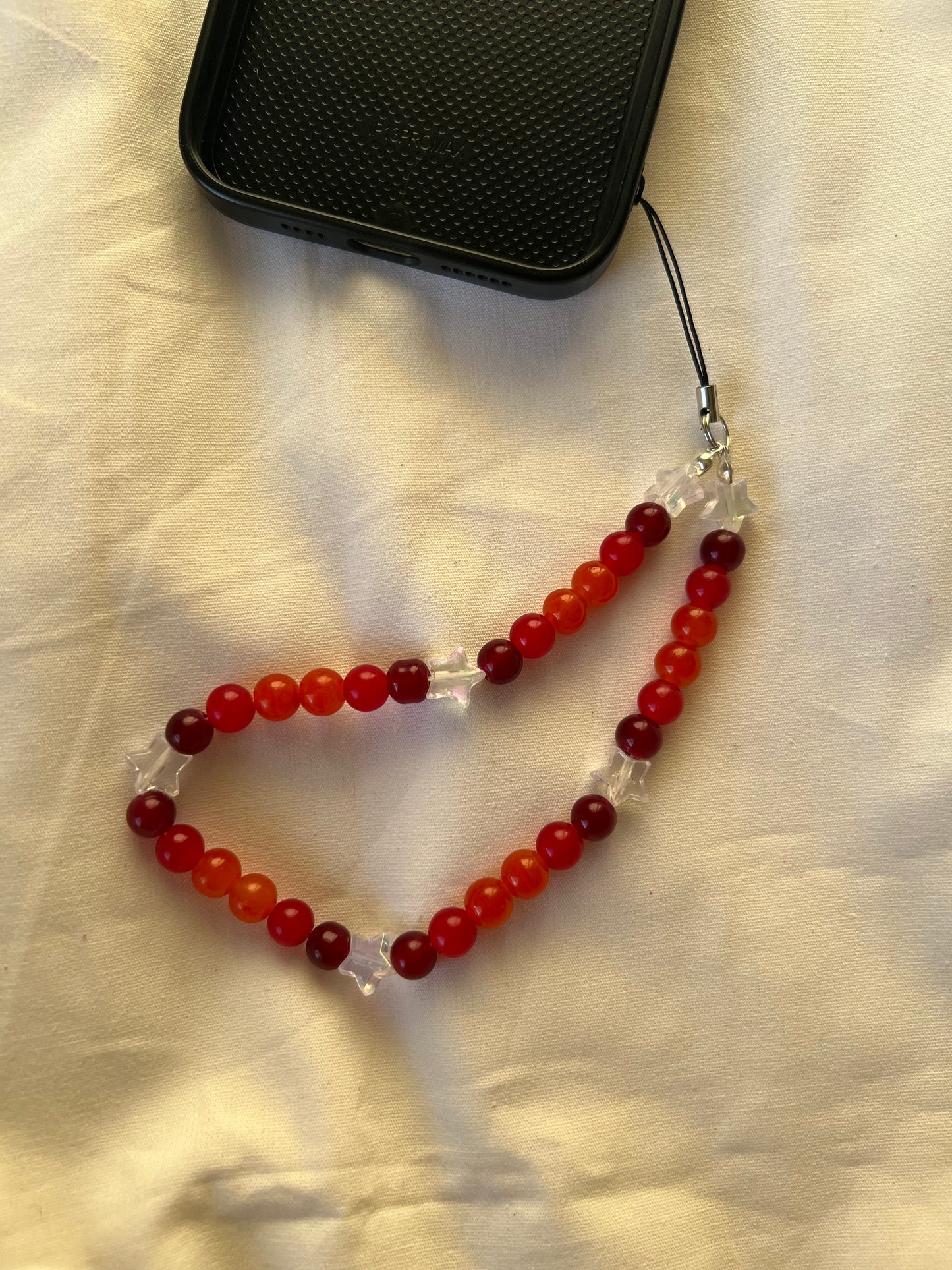 Red star phone charm